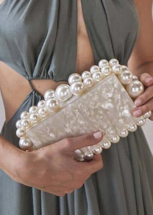 ways to wear pearls without looking old fashioned modern clutch handbag purse
