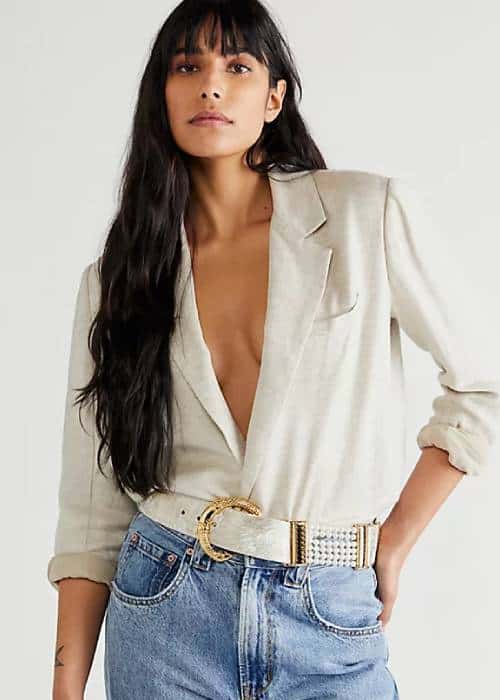 ways to wear pearls without looking old fashioned woman wearing modern pearl belt