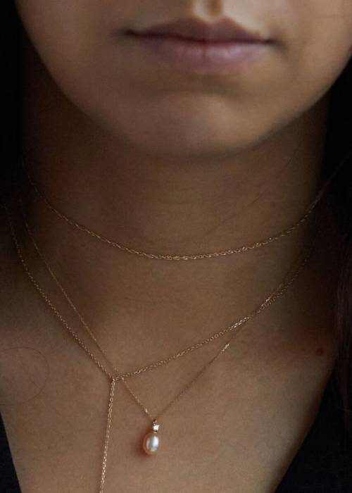 14 Stylish Ways to Wear Pearls Without Looking OldFashioned Closet