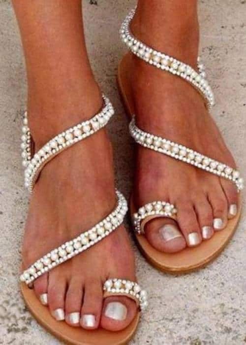 ways to wear pearls without looking old fashioned young woman wearing modern pearl sandals