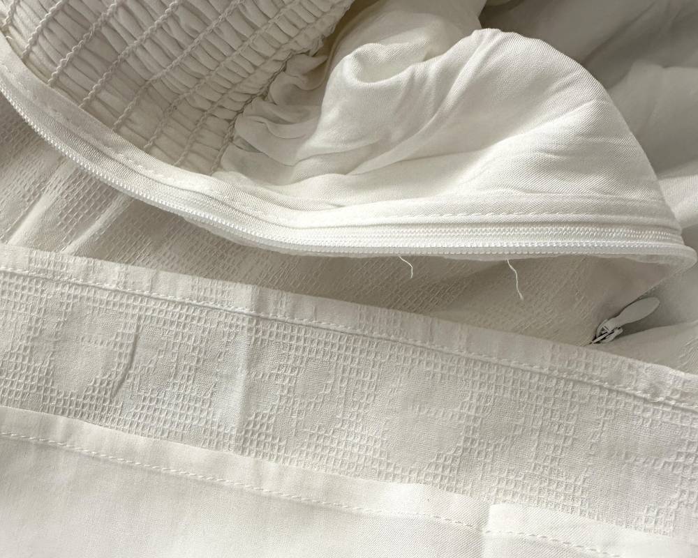 close up photo of tidy stitching and some loose threads on lulus simplicity dress