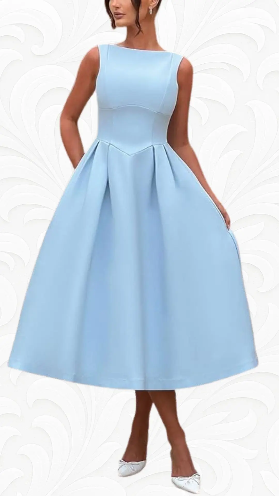 A light blue A-line dress features a fitted bodice with a crew neckline and subtle pleats that flow into a knee-length skirt. The dress is paired with elegant white shoes and a smooth, textured background adds a soft, refined touch. This design is suitable for a spring wedding, offering a timeless and classic look.