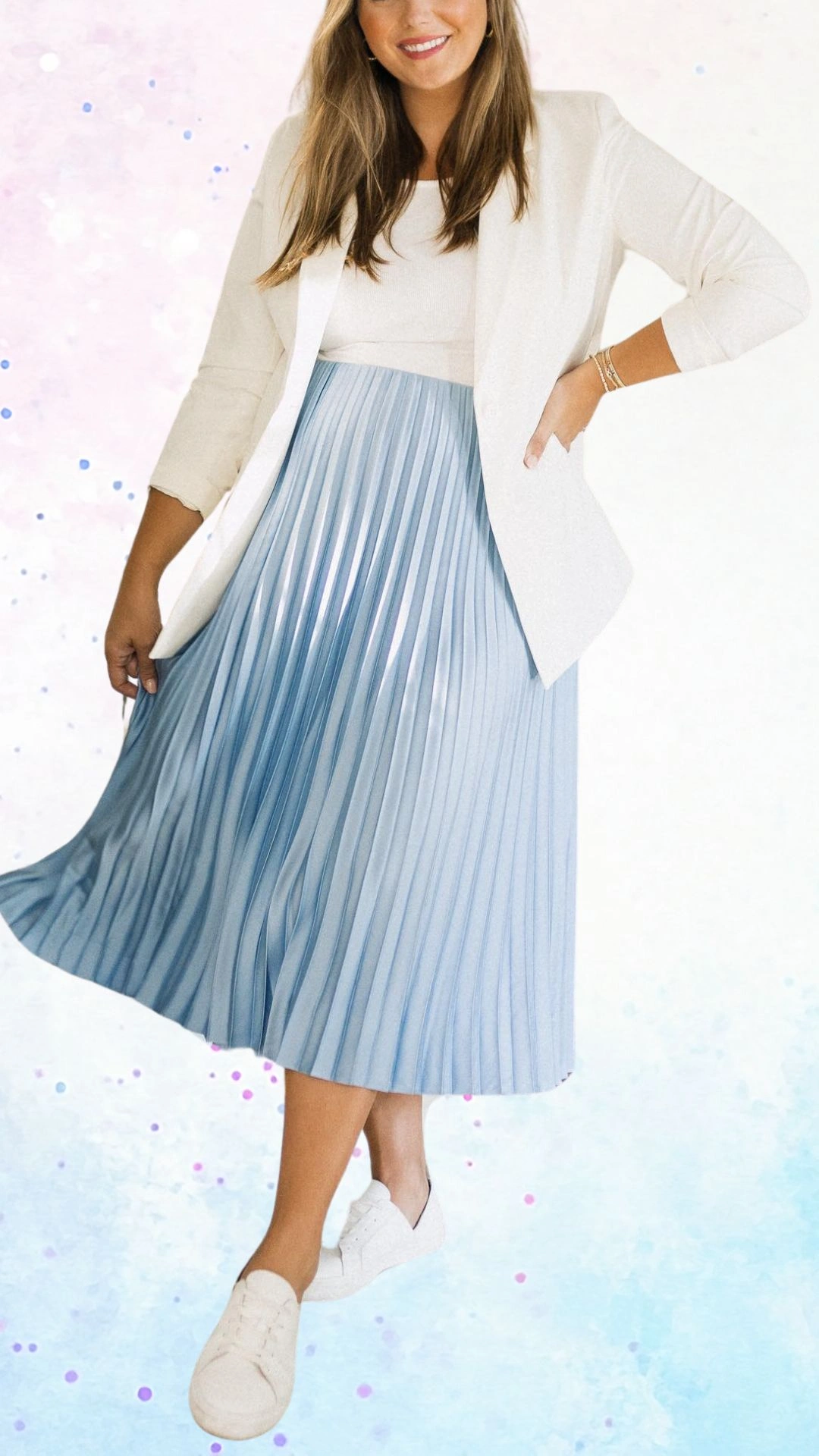 The outfit features a white blazer paired with a flowing, pleated light blue midi skirt, made from a shiny, lightweight fabric that adds a festive touch suitable for a baby shower. The outfit is completed with comfortable white sneakers, offering a blend of elegance and ease for the celebratory occasion. The three-quarter sleeves of the blazer and the soft shades of blue and white create a fresh, inviting look.