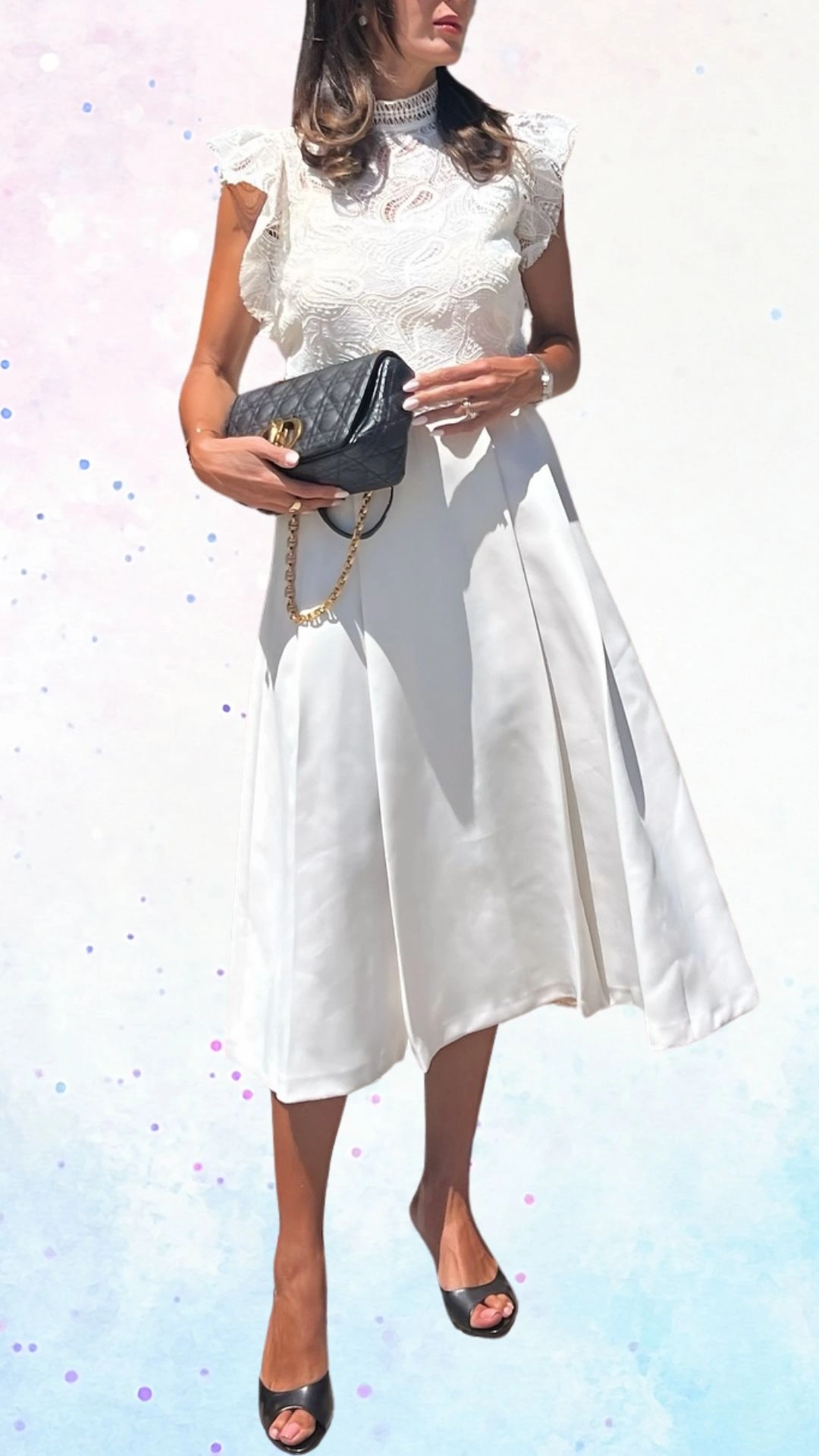 The outfit features a flowing white dress with delicate lace detailing at the fitted bodice and flutter sleeves, complemented by a high neckline. The skirt is made of a smooth, lightweight fabric with subtle pleats that enhance its elegant silhouette, perfect for a baby shower celebration. Paired with a chic black clutch and open-toe heels, this ensemble balances softness and sophistication.