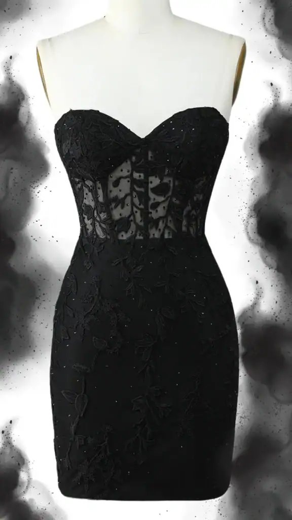 This black homecoming dress features a fitted silhouette with a strapless, sweetheart neckline, showcasing an intricate floral lace overlay embellished with sequins for added texture and shine. The dress embodies a chic and edgy vibe, making it ideal for formal events such as homecoming or prom, and is designed for teenage girls seeking a trendy and elegant look.