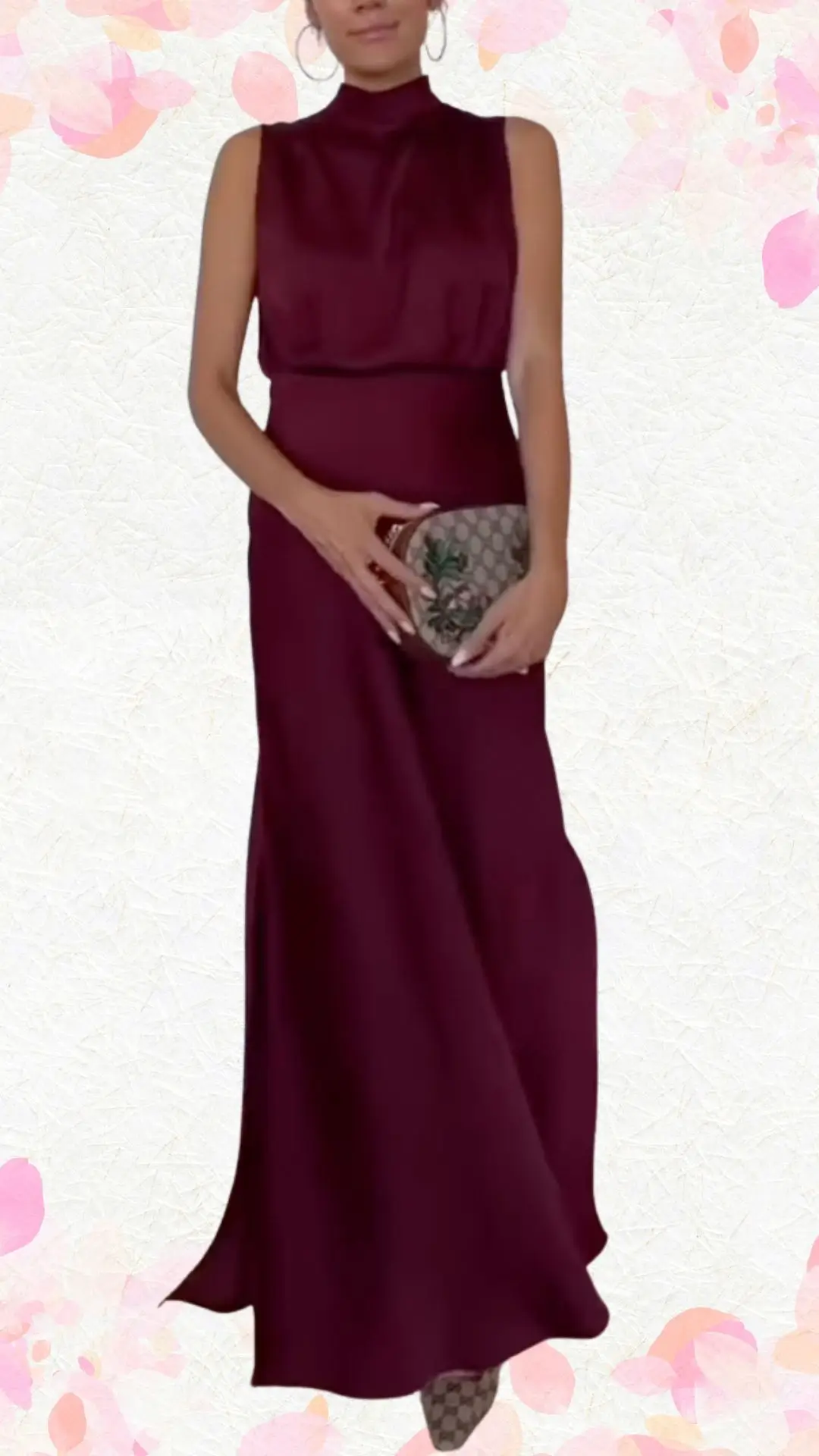 The outfit features a sleeveless, mock-neck burgundy gown made of a smooth, luxurious fabric that drapes elegantly to the floor. Its fitted silhouette includes subtle pleats at the waist, enhancing the feminine form while maintaining a playful yet sophisticated vibe. The wearer accessorizes with a stylish clutch, completing a look that is festive without being overly formal.