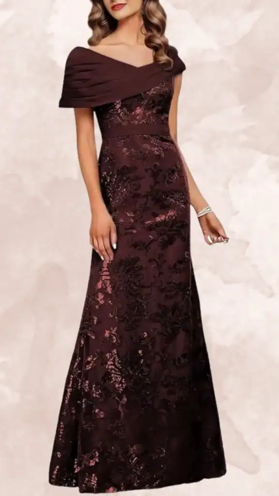 This brown bridesmaid dress features an elegant off-shoulder neckline with draped detailing and a fitted waist, cascading into a floor-length silhouette. It is adorned with a rich floral pattern in dark burgundy and hints of rose, adding depth and visual interest. The fabric has a subtle sheen, enhancing the dress's formal appeal while providing a touch of sophistication.