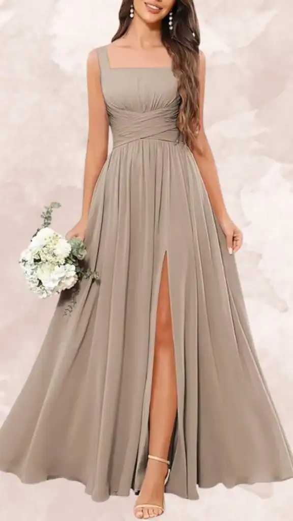 This brown bridesmaid dress features a square neckline and a fitted bodice with gathered detailing at the waist, leading to a floor-length skirt that includes a thigh-high slit for added elegance. The soft, flowing fabric drapes gracefully, creating a sense of movement and sophistication. Its muted brown tone offers a versatile option for various wedding color schemes, allowing for easy pairing with floral bouquets or accessories.