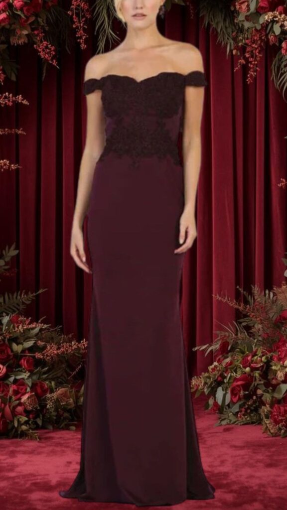 This burgundy bridesmaid dress features an elegant off-the-shoulder neckline and a fitted silhouette that flows gracefully to the floor. The bodice is adorned with intricate lace detailing, while the dress has a subtle slit on one side that adds a touch of sophistication. The rich burgundy color enhances its luxurious appearance, making it an ideal choice for a formal wedding setting.
