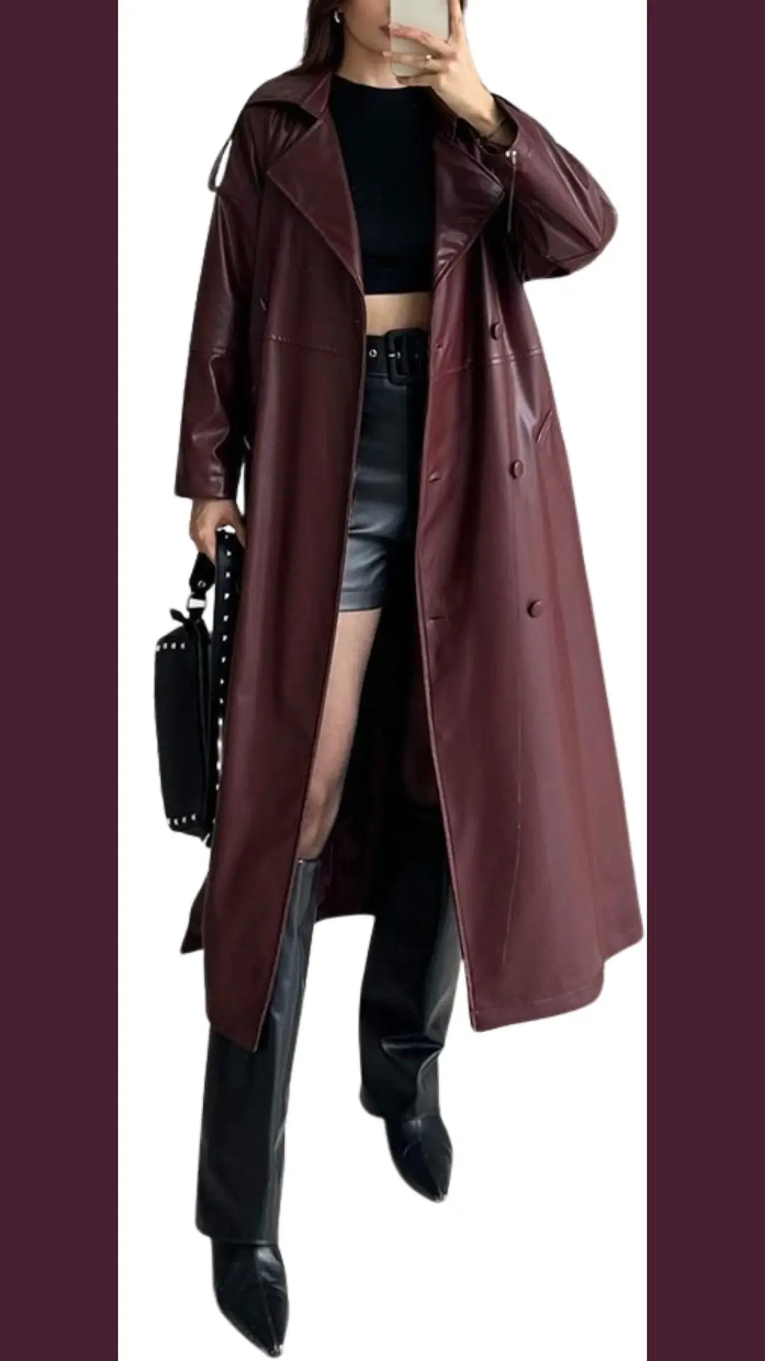 A stylish burgundy leather coat features a double-breasted design with wide lapels, paired with a fitted black crop top and sleek black faux leather shorts. The outfit is completed with high-heeled black pointed-toe boots that add sophistication. The overall look combines rich textures and bold shades, creating a modern and chic appearance.