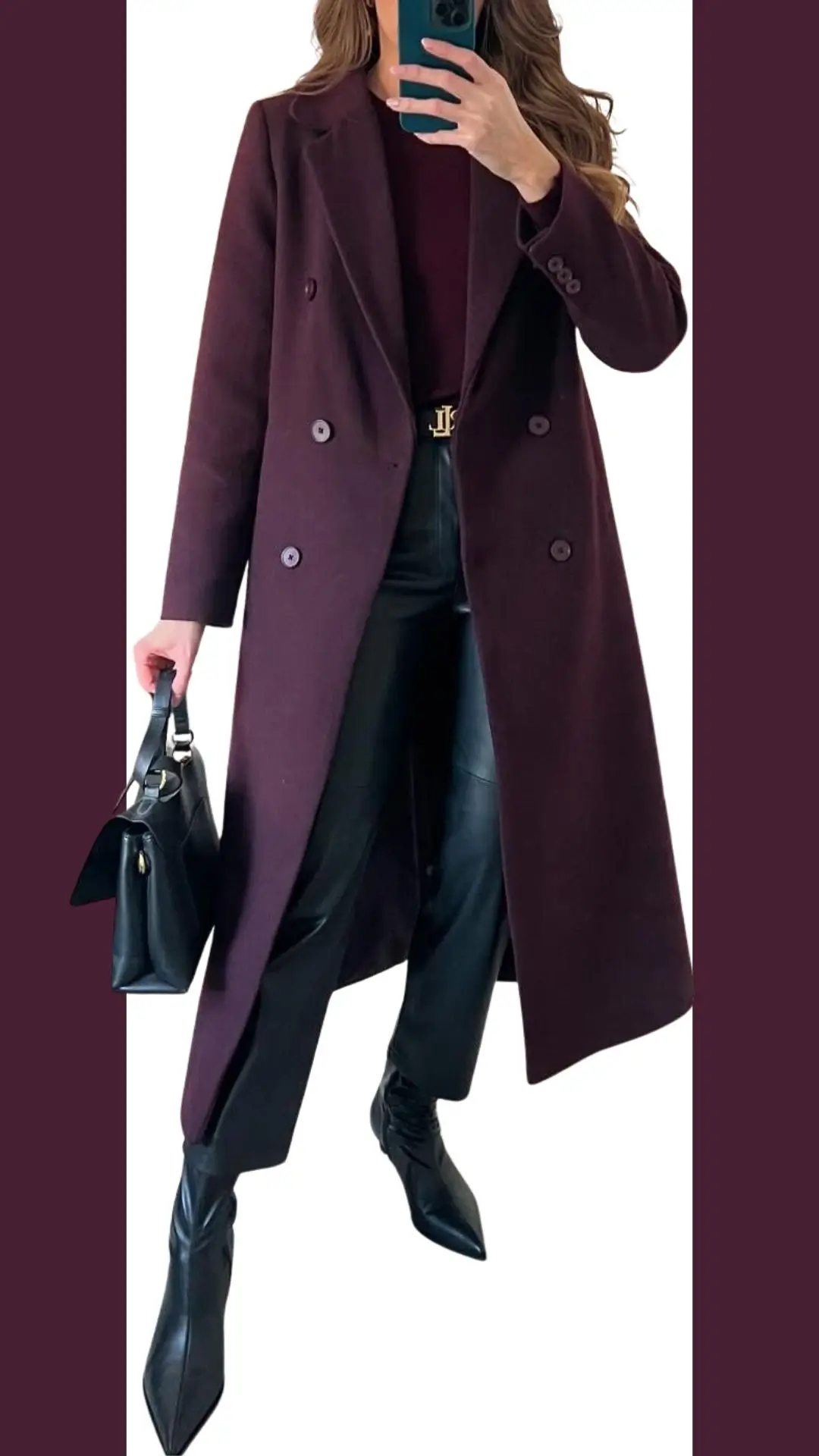 A tailored burgundy double-breasted coat is paired with a matching fitted top, accentuating its rich hue and soft texture. The outfit features sleek black leather pants and pointed black ankle boots, creating a refined silhouette. A structured black handbag adds a polished finishing touch.