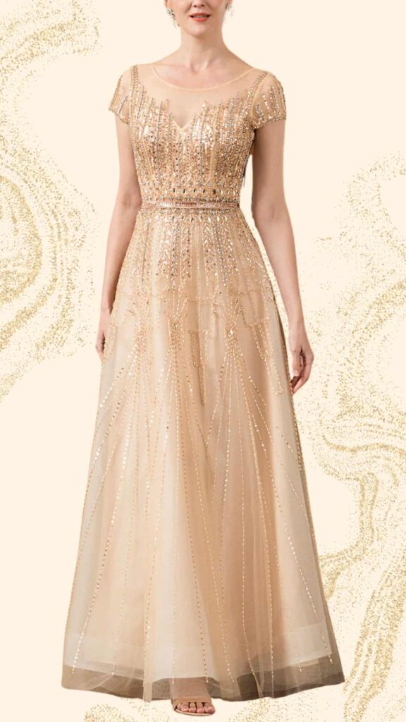 This champagne mother of the bride dress features a floor-length silhouette with a flattering fit-and-flare design. It has a scoop neckline and cap sleeves adorned with intricate beading and sequins, creating a shimmering effect. The textured tulle overlay adds elegance and dimension, making it an ideal choice for a formal wedding.