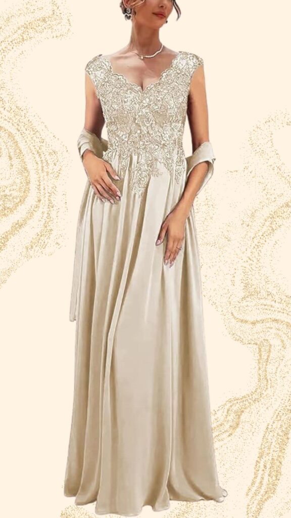 Elegant champagne mother of the bride dress featuring a long, flowing silhouette that reaches the floor. The gown has a deep V-neckline adorned with intricate lace detailing, and it is sleeveless with delicate draped accents providing an elegant touch. The soft satin fabric offers a luxurious sheen, making it a sophisticated choice for a wedding celebration.