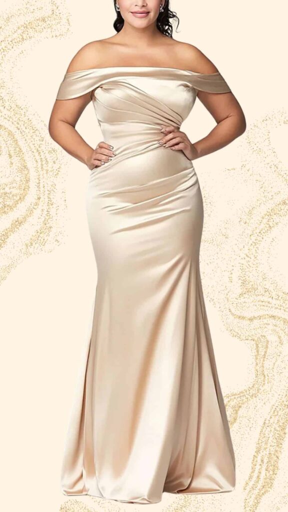 This elegant champagne mother of the bride dress features a fitted mermaid silhouette that gracefully flares at the hem. It has a sophisticated off-the-shoulder neckline and is adorned with soft draping, enhancing its luxe satin texture. The gown offers a timeless and classy aesthetic, perfect for a formal wedding.