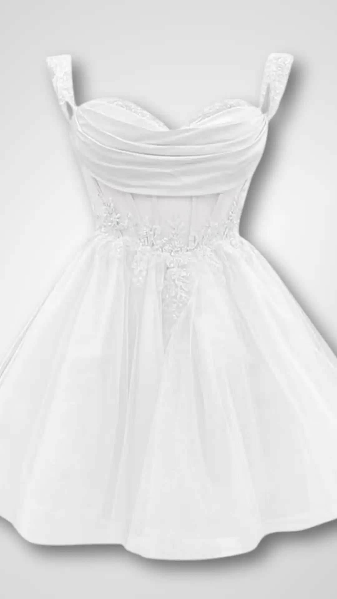This elegant white homecoming dress features a fitted, sweetheart bodice with delicate ruching and sheer straps, complemented by intricate floral embroidery at the waist. The voluminous skirt is made from lightweight tulle, creating a romantic and ethereal vibe, perfect for teenage girls attending a formal event like homecoming or prom.