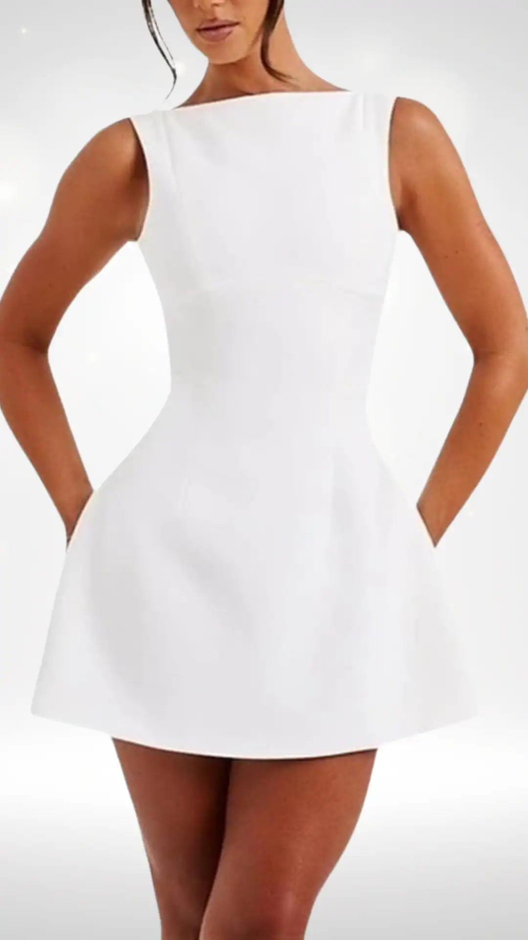 This elegant white homecoming dress features a fitted bodice with a modest neckline and a flared, voluminous skirt that adds playful movement. Made from a smooth, structured fabric, it exudes a fresh, minimalist vibe perfect for teenage girls attending a formal event or school dance, embodying a chic and youthful aesthetic.