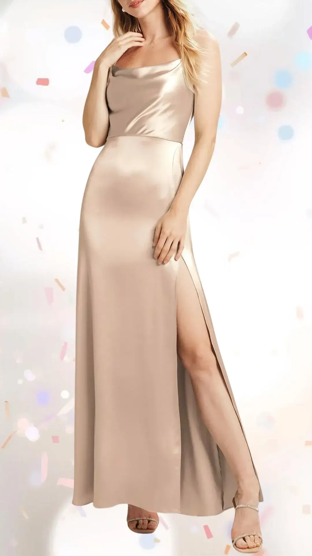 The dress features a soft, draping cowl neckline and long, flowing sleeves, crafted from a smooth satin fabric in a warm beige tone. It includes a playful side slit, enhancing its elegant silhouette, while the subtle sheen adds a touch of sophistication, making it ideal for a festive engagement party. Completing the look, delicate strappy heels complement the outfit, adding a whimsical yet classy flair.