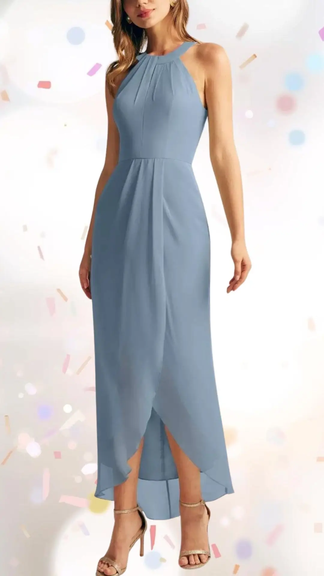 The dress features a sophisticated halter neckline and a fitted bodice that flows into a delicate, knee-length skirt with subtle front slits. Made from lightweight chiffon in a soft, muted blue shade, it showcases elegant pleating at the chest and a breezy, tiered hem that adds a touch of whimsy, making it perfect for an engagement party. The outfit is paired with strappy, metallic heels, enhancing its elevated yet playful vibe.