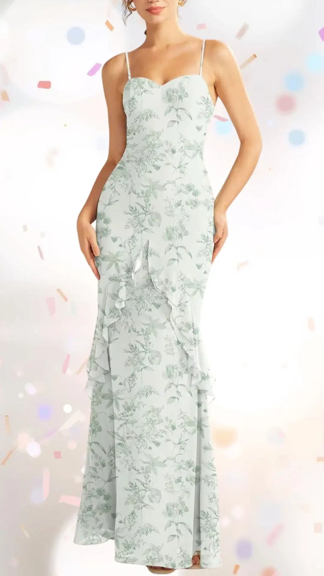 A light mint green floral maxi dress features delicate spaghetti straps and a sweetheart neckline, perfect for an engagement party. The garment is crafted from a soft, flowing fabric with gentle pleats and cascading ruffles along the hem, adding a touch of whimsy while maintaining an elegant silhouette. This design strikes a balance between refined and playful, making it suitable for a festive celebration.