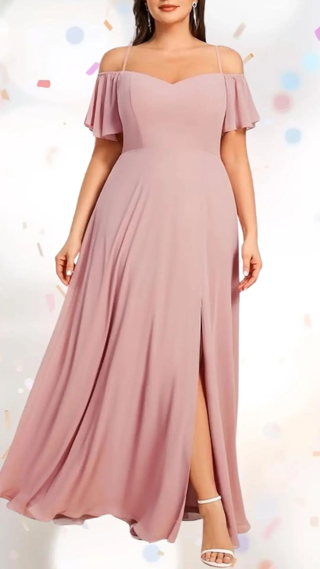 This elegant engagement party dress features a soft pink, flowing fabric with a flattering A-line silhouette. The off-the-shoulder flutter sleeves and sweetheart neckline add a playful touch, while a subtle thigh-high slit enhances its whimsy without compromising sophistication. The outfit is complemented by white strappy heels, making it an ideal choice for a celebratory occasion.