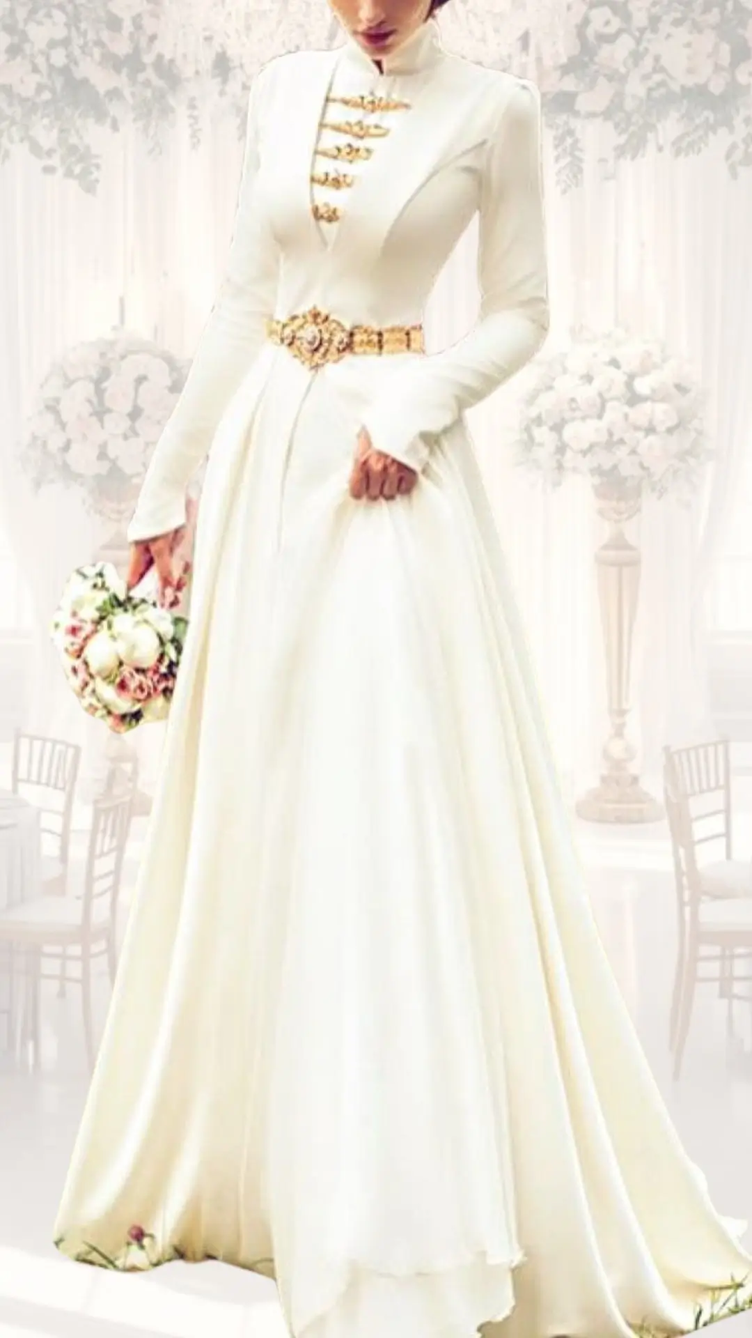 This high neck wedding gown features a sophisticated, structured silhouette made from soft, flowing fabric in a timeless ivory shade. Elegant, long sleeves and a modest neckline complement the vintage-inspired design, while a delicate gold belt accentuates the waist, leading to a gracefully draped skirt that gently sweeps the floor, making it ideal for a winter or vintage-themed wedding. Subtle floral details at the hem add charm without compromising its classy, modest aesthetic.