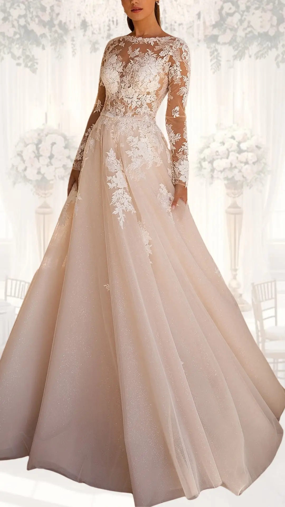 This high neck wedding gown features a delicate lace bodice adorned with intricate floral appliqués and long, fitted sleeves, creating an elegant, modest silhouette. The flowing skirt, crafted from soft tulle with a subtle shimmer, sweeps gracefully to the floor, making it an ideal choice for a winter wedding or vintage-inspired celebration. The gown's warm, neutral shade enhances its timeless appeal while maintaining a classy aesthetic.
