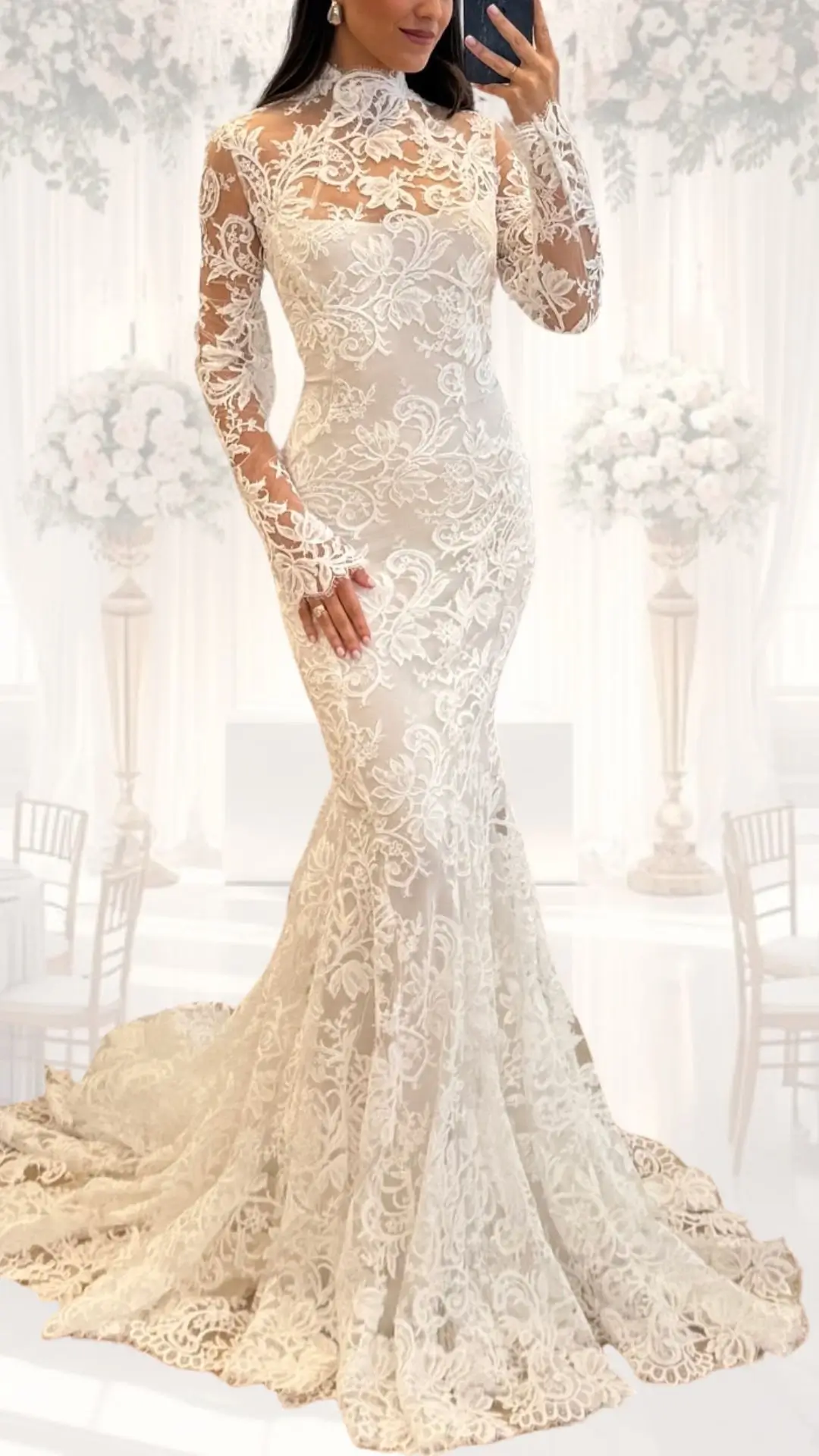 This high neck wedding gown features delicate lace in a soft ivory shade, accentuating its classy and modest aesthetic, ideal for a winter or vintage wedding. The long, fitted sleeves and intricate floral embroidery flow seamlessly into a mermaid skirt, finishing with a graceful train that adds elegance and drama. The structured high neckline enhances the timeless style, perfect for brides seeking sophistication and warmth.