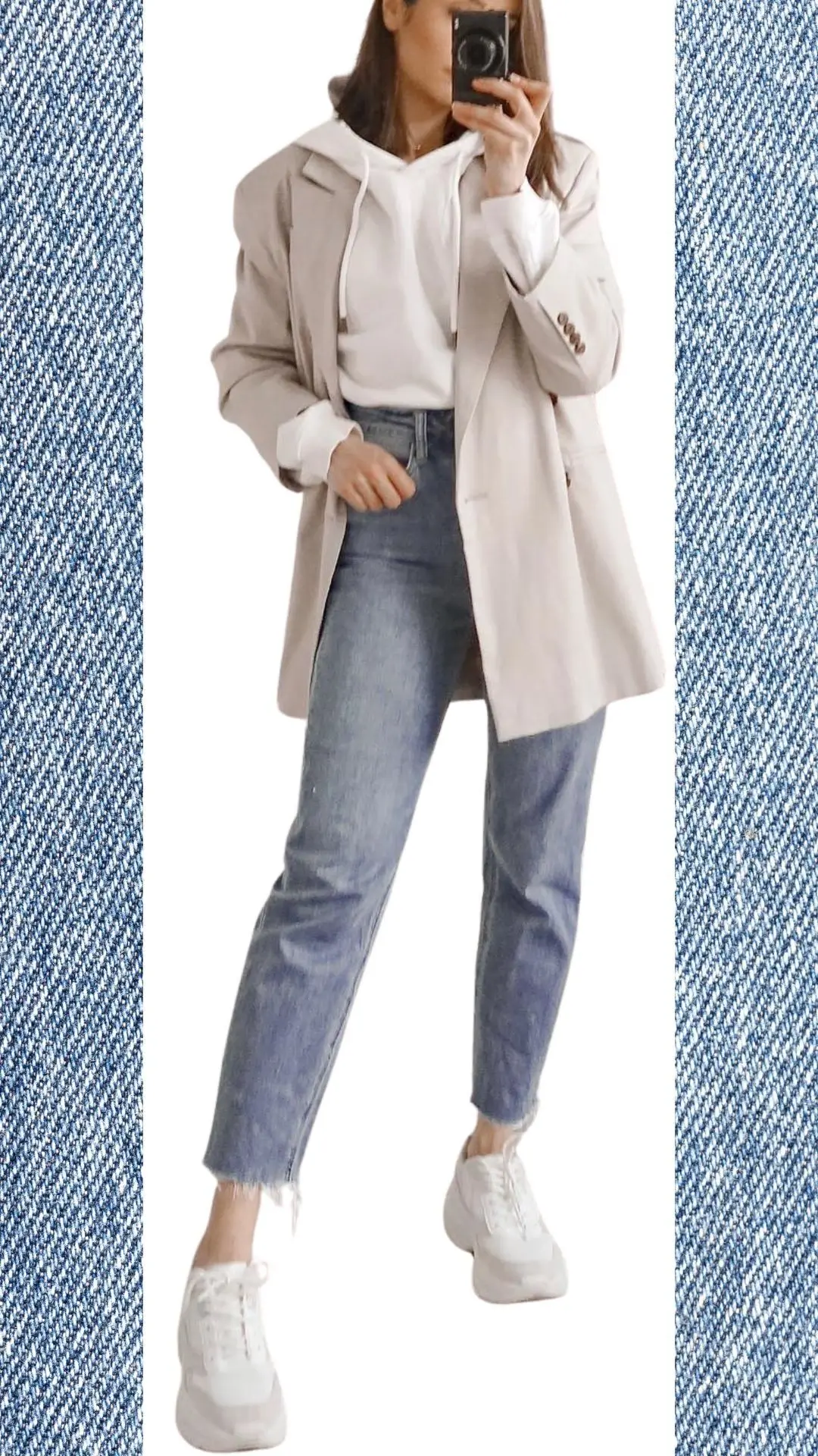 The outfit features a pair of light blue, slightly distressed jeans made from soft denim, providing a relaxed fit and a modern look. It is paired with a cream-colored hoodie layered under a tailored beige blazer, combining cozy and stylish elements suitable for colder months, complemented by white sneakers for a casual finish. The overall color palette transitions seamlessly from winter to spring, blending warmth and freshness.