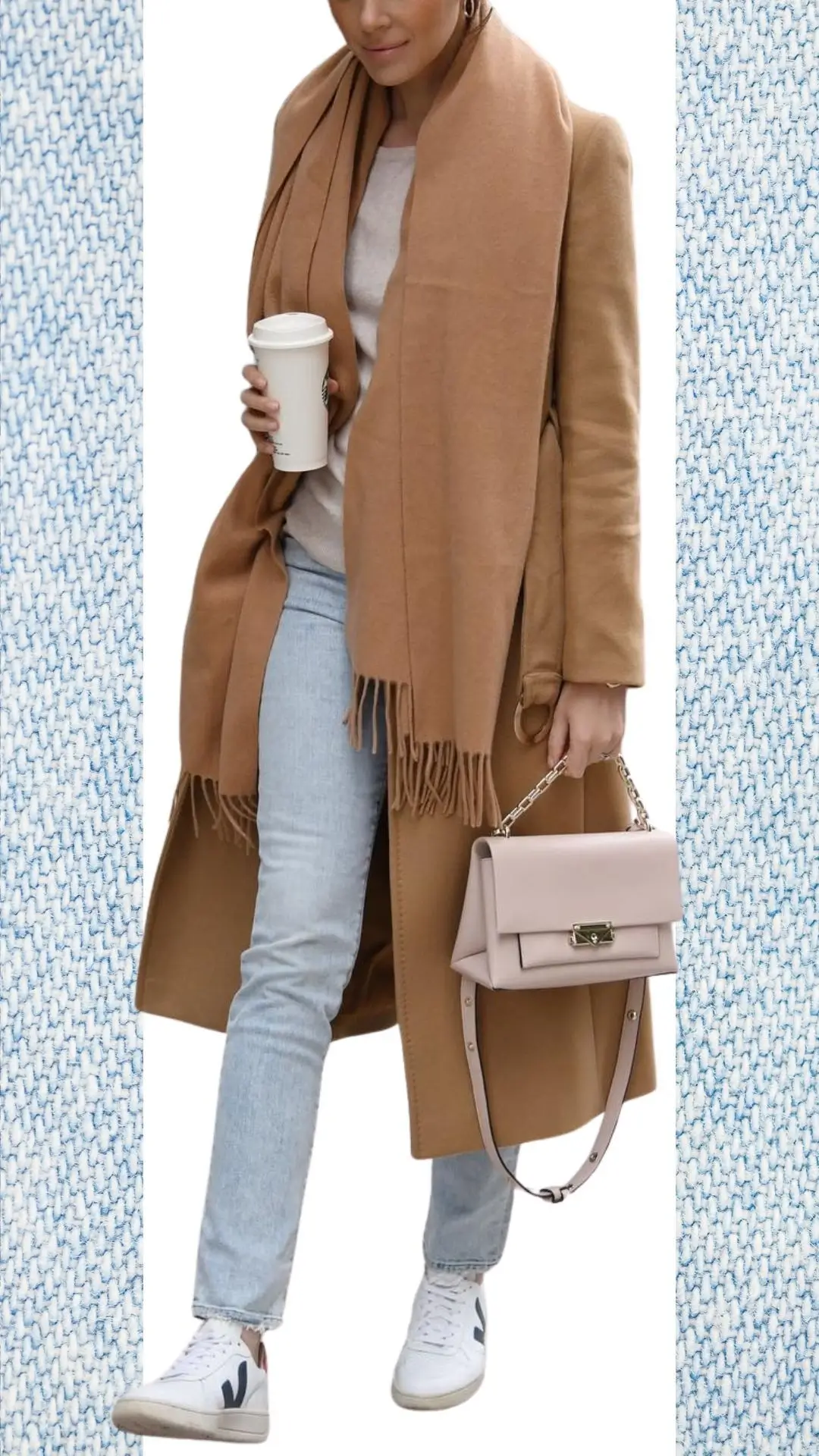 A stylish outfit features light blue, slightly distressed jeans paired with a cozy beige sweater and a long camel-colored coat, offering warmth for colder months. The look is enhanced by a soft, matching camel scarf and casual white sneakers, complemented by a petite pink handbag for a pop of color. This combination is perfect for transitioning from winter to spring while remaining chic and comfortable.