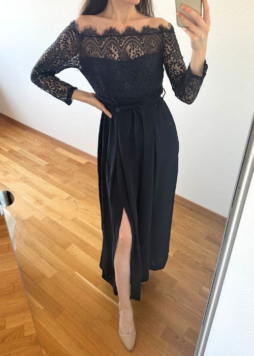 Woman wearing formal navy jumpsuit with lace detail from lightinthebox