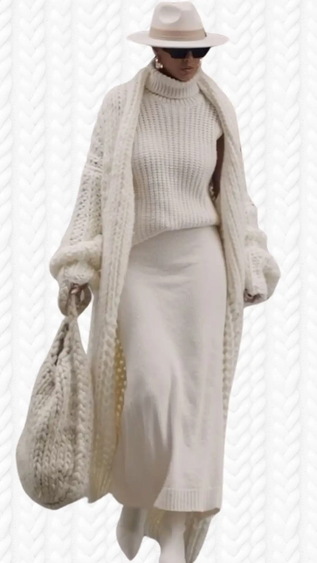 A cozy, chunky knit long cardigan in soft white drapes over a fitted, ribbed white turtleneck and a matching pencil skirt, creating a seamless monochromatic look. Complemented by a stylish wide-brimmed hat and oversized sunglasses, the outfit features textured fabrics that enhance its elegance and warmth. The ensemble is completed with white knee-high boots, adding a chic touch to this sophisticated, layered outfit.