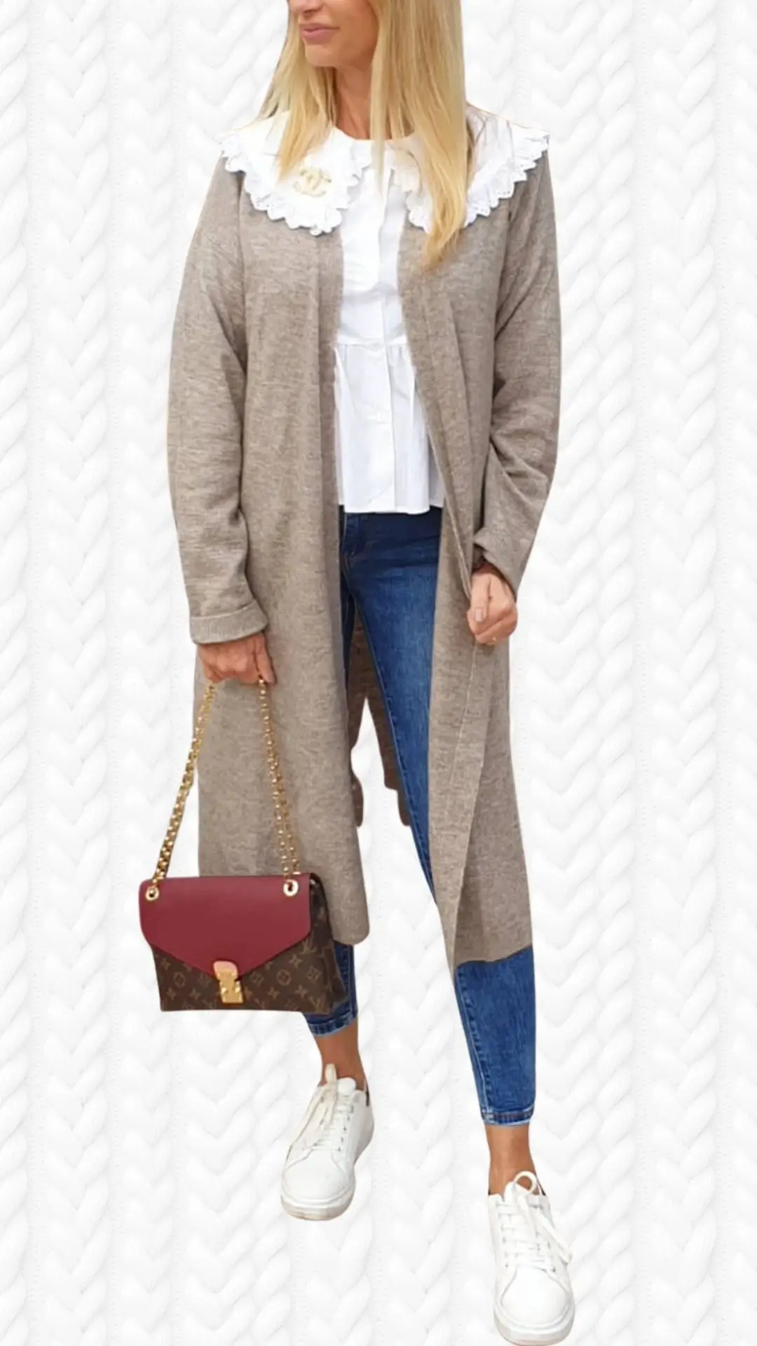 A long beige cardigan made from a soft, lightweight knit drapes elegantly over a white blouse with a frilly collar. The outfit features fitted blue jeans and stylish white sneakers, complemented by a chic maroon handbag with gold accents. The cardigan's open front creates a relaxed silhouette, making it a versatile addition to the ensemble.