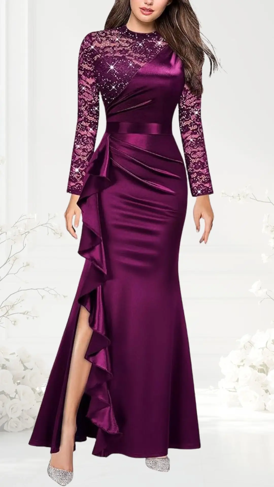 A maroon wedding guest dress features long, lace sleeves and a fitted bodice, creating an elegant silhouette. The gown has a cascading ruffle detail on one side, with a high slit that adds a sophisticated touch. Sparkling embellishments accent the lace, enhancing its visual appeal.