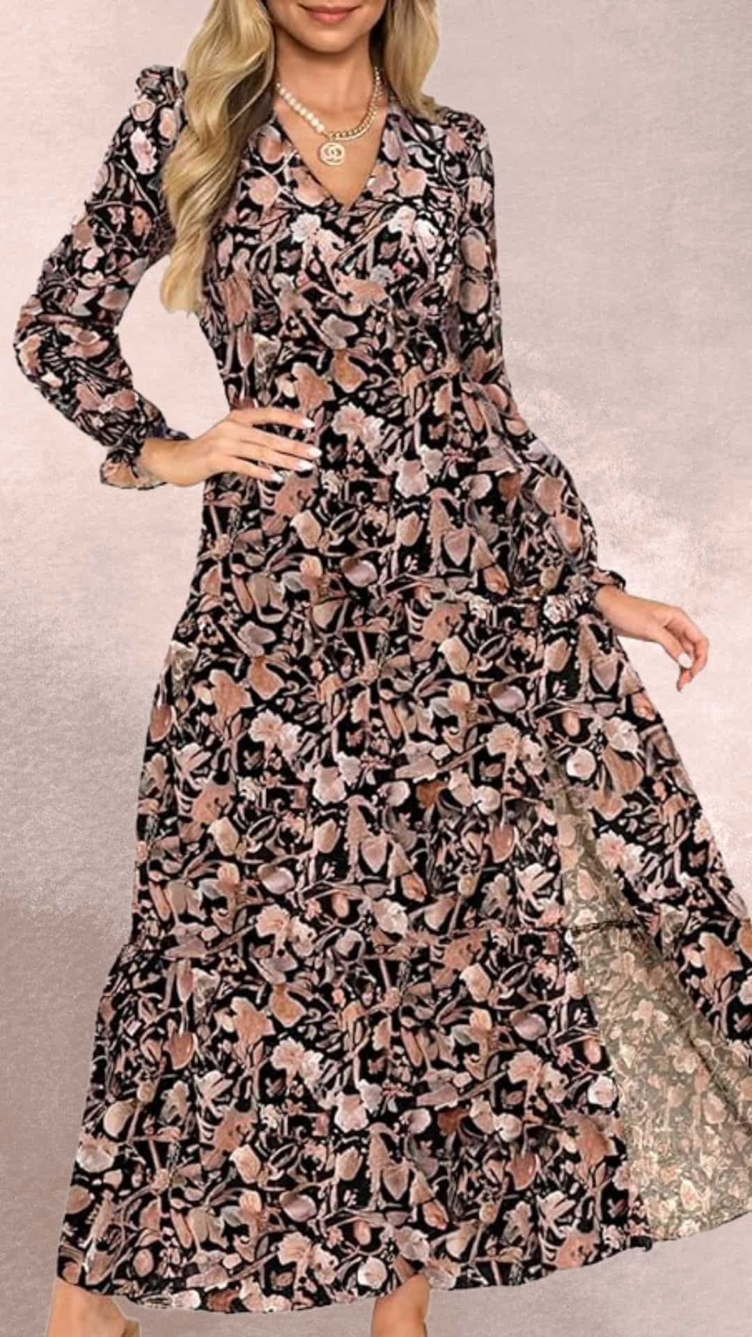 This elegant maxi dress features a black background adorned with soft, muted floral patterns in shades of pink, peach, and cream, capturing a country western vibe. The dress has a classic V-neckline, long puffed sleeves, and a flowy skirt that billows delicately, enhancing its timeless charm. Its design makes it an ideal match for cowboy boots, providing a stylish yet rustic look.
