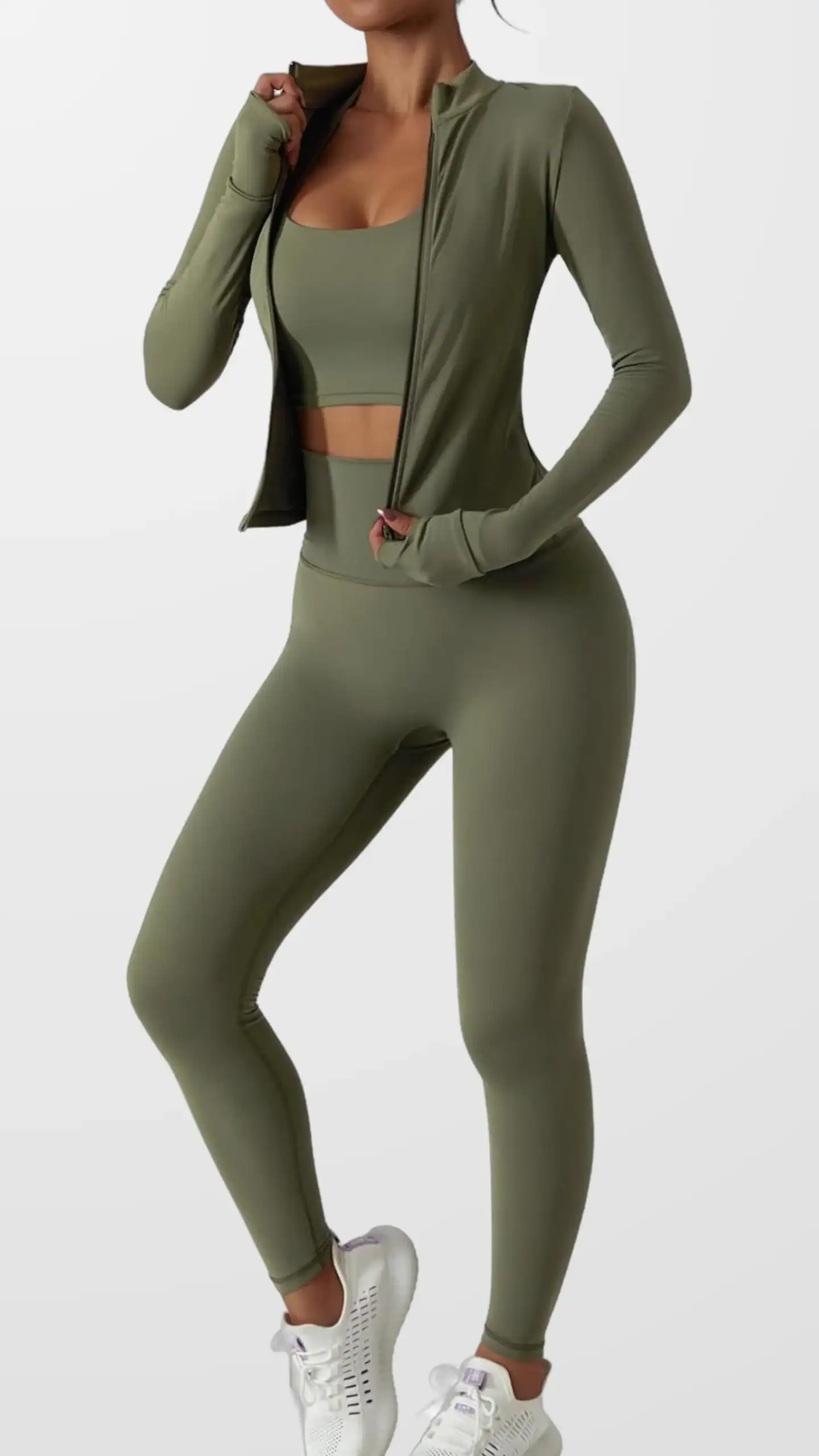 This seamless high-waisted legging set features a sophisticated olive green color, crafted from soft, stretchy fabric that is breathable and moisture-wicking. The design showcases a wide, double-layered waistband for tummy control, providing a chic and streamlined look perfect for workouts or casual outings.