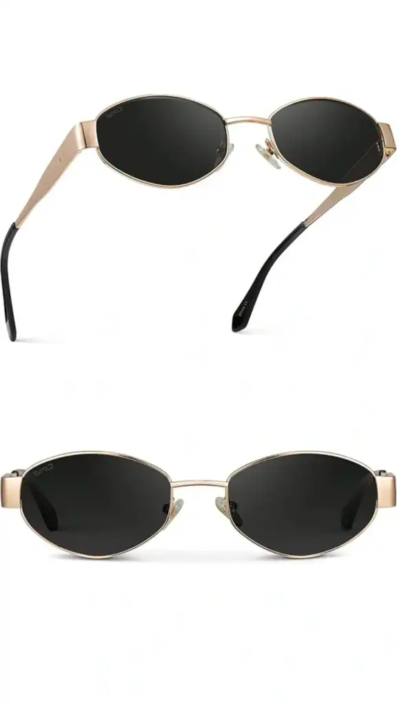 A pair of sleek oval sunglasses featuring a thin gold metal frame with black accents along the temples. The lenses are dark and provide a stylish contrast to the lightweight frame, making them an ideal accessory for fall outfits. With a retro-inspired design, these sunglasses are both chic and versatile, fitting comfortably on the face for everyday wear.