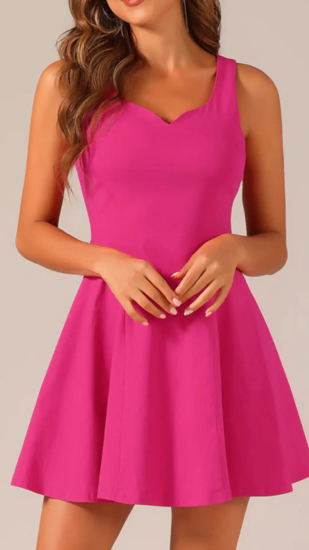 This playful, bright pink homecoming dress features a fitted bodice with a flattering V-neckline and a flared, slightly voluminous skirt that adds movement and charm. Made from a smooth, lightweight fabric, it exudes a trendy and youthful vibe, perfect for formal events like homecoming and school dances, designed specifically for teenagers.