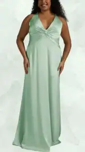 This plus size wedding guest dress features a flattering deep V-neckline and elegant halter straps, with a twisted knot detailing at the bust that adds dimension to the bodice. The gown cascades gracefully to the floor in a light mint green shade, offering a smooth, flowing silhouette perfect for formal occasions. The design emphasizes comfort while maintaining a chic aesthetic, making it an excellent choice for any wedding celebration.