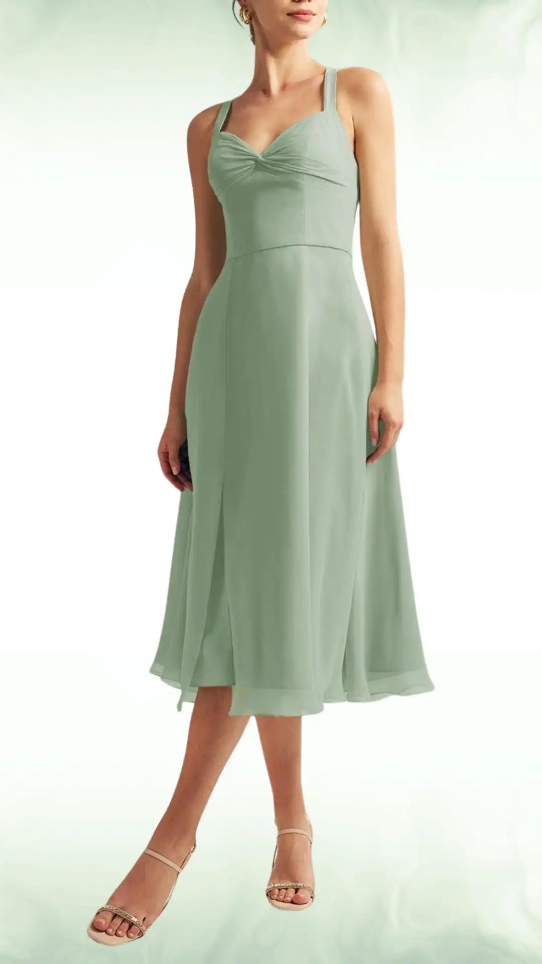 Sage green fall wedding guest dress featuring a fitted bodice with a twist design and a flowing midi-length skirt, crafted from soft fabric, perfect for formal events.