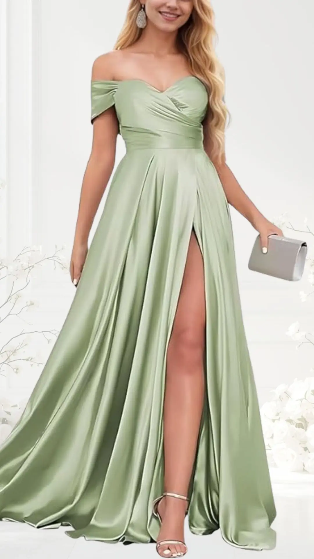 The dress is a sage green, floor-length gown featuring an off-the-shoulder design and a fitted bodice with a twisted fabric detail at the neckline. It has a high slit on one side, allowing for easy movement, and the soft satin material creates a flowing silhouette. The outfit is accessorized with a silver clutch and strappy heels, enhancing its elegant look.