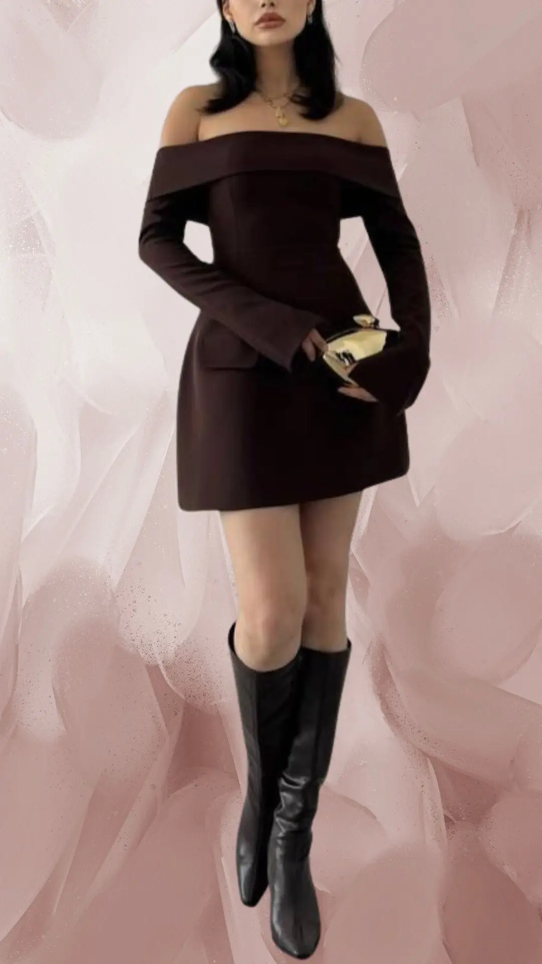 The outfit features a short, form-fitting brown dress made of a smooth fabric with a sleek, slightly structured bodice and off-the-shoulder neckline. Long sleeves with flared cuffs add elegance, complemented by knee-high black boots that enhance the chic silhouette. A small golden clutch completes the ensemble, adding a touch of sophistication.