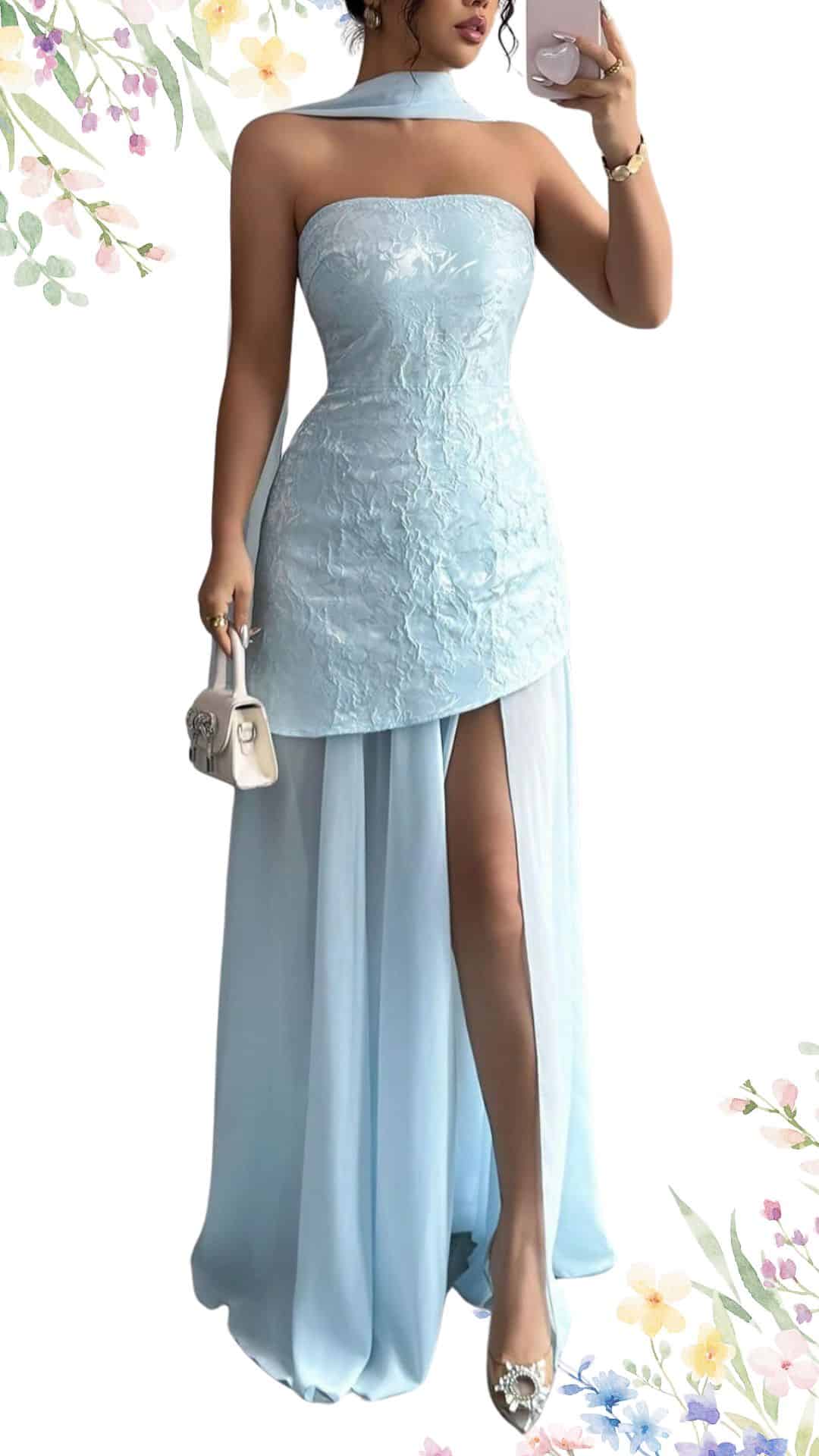 This elegant sleeveless dress features a strapless design with a fitted bodice made from delicate, textured lace in a soft baby blue hue. The long skirt has a flowing silhouette with a high slit for added allure, combining sophistication with a modern touch, perfect for a spring wedding.