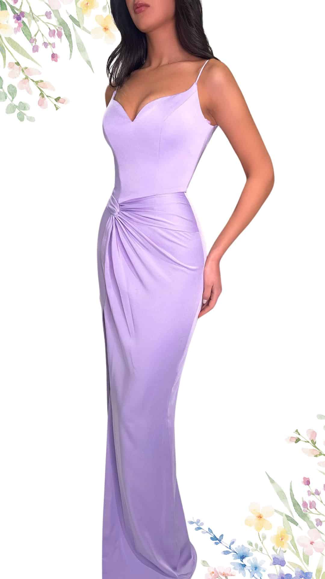 This elegant spring wedding guest dress features a soft lilac hue with a sleek, fitted silhouette. The floor-length design is complemented by a plunging V-neckline and delicate spaghetti straps, while a sophisticated twisted detail at the waist adds texture and visual interest. The fabric has a smooth, slightly stretchy quality that enhances both comfort and movement.