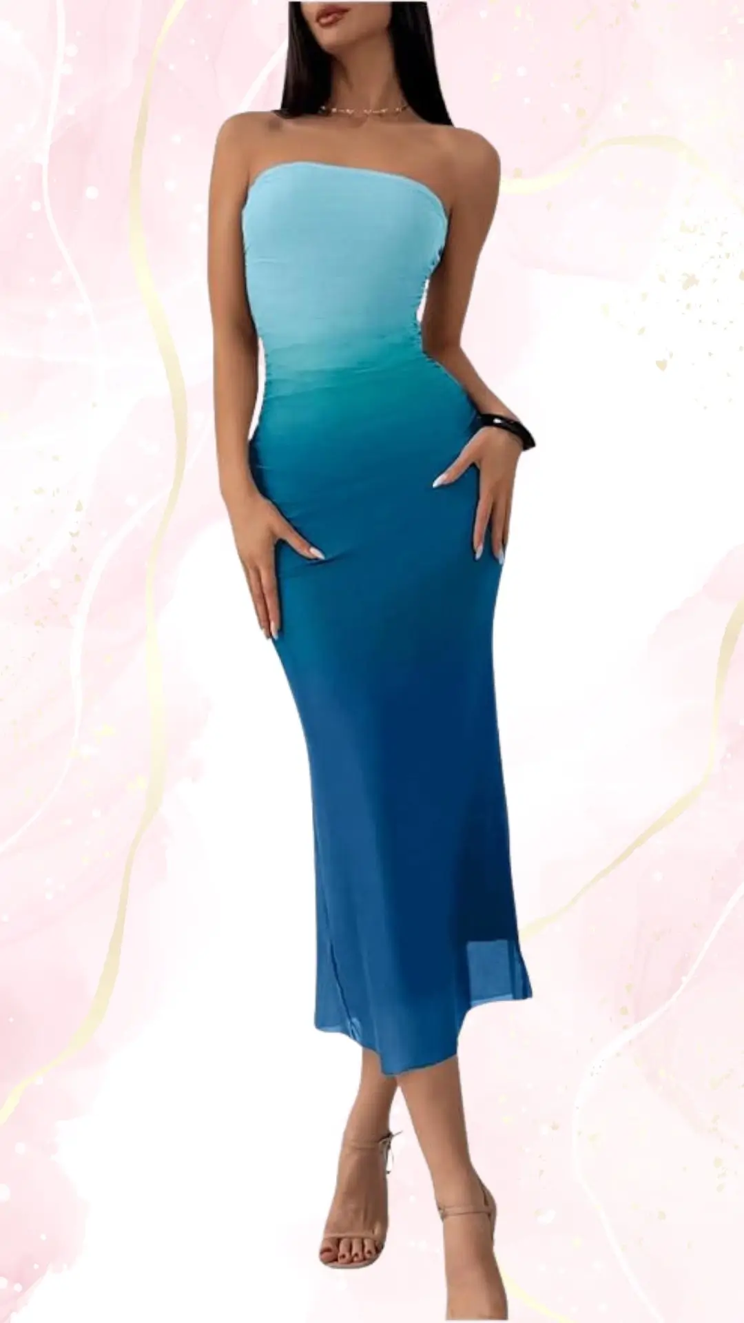 A summer strapless wedding guest dress featuring a gradient color scheme that transitions from light blue at the bodice to deep blue at the hem. The fitted silhouette falls to mid-calf, complemented by a pair of nude strappy heels. The dress offers a sleek and elegant look, suitable for formal occasions.