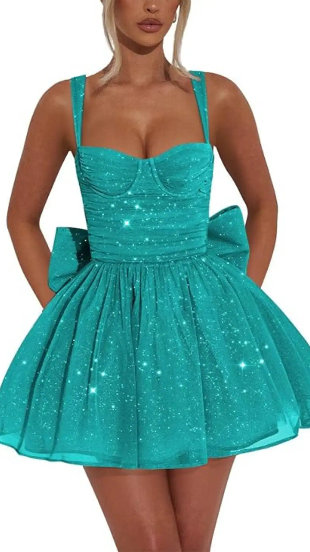 This striking homecoming dress features a fitted bodice with a sweetheart neckline, crafted from a shimmering turquoise fabric adorned with sparkly detailing, creating a glamorous effect. The flared skirt provides playful volume, while the oversized bow at the back adds a whimsical touch, making it perfect for a festive occasion like homecoming for teenage girls.