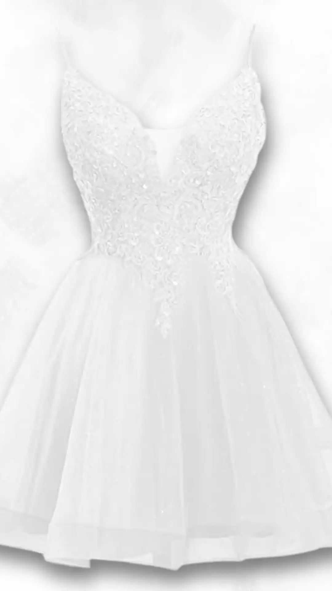 This white homecoming dress features a fitted bodice adorned with intricate embroidery and delicate embellishments, leading to a voluminous skirt made from layered tulle for added texture. The overall vibe is romantic and ethereal, making it a perfect choice for a formal event like homecoming, designed specifically for teenage girls.