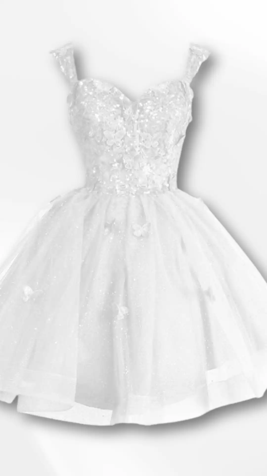This white homecoming dress features a sweetheart neckline and delicate beaded embellishments on a corseted bodice, paired with a voluminous tulle skirt that adds a whimsical touch. The overall vibe is romantic and ethereal, making it a perfect choice for teenage girls attending formal events like homecoming or prom.