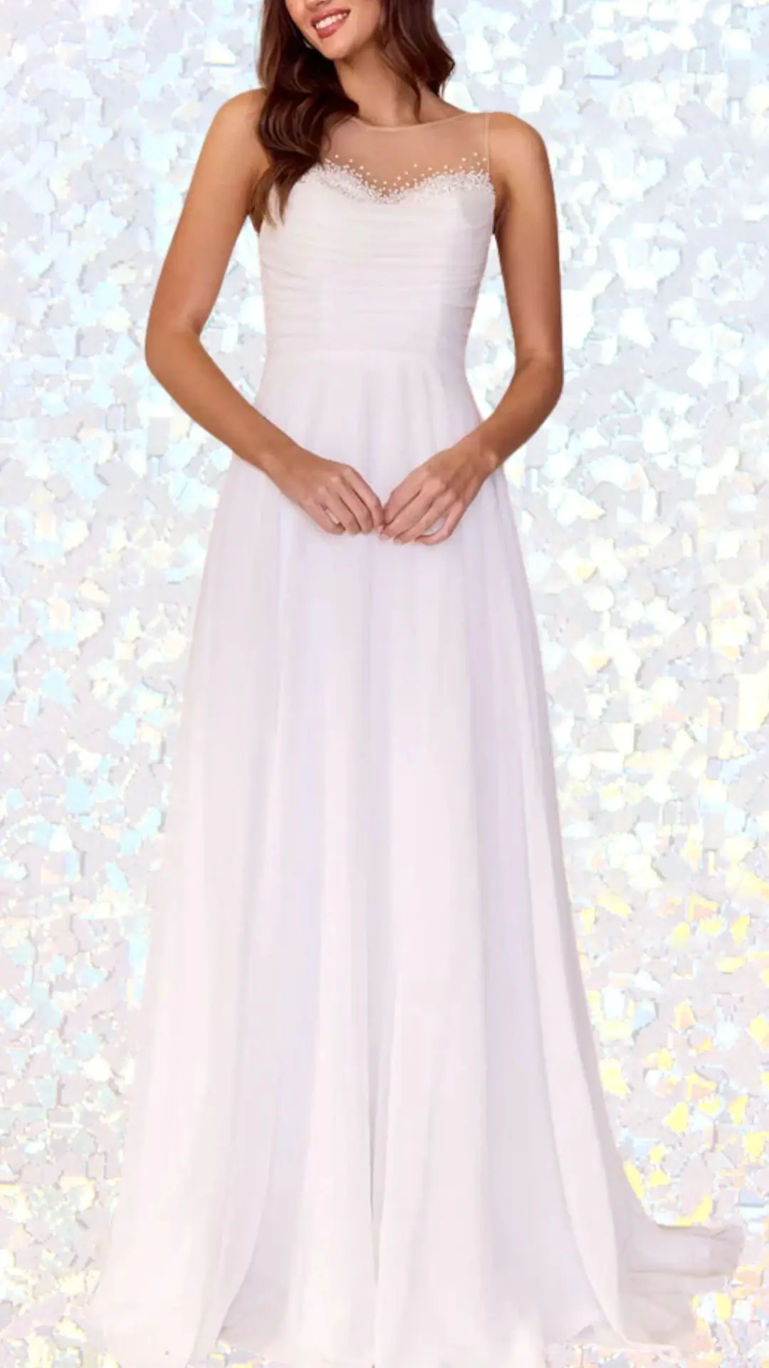 This elegant long white winter formal dress features a fitted bodice with a sweet heart neckline adorned with delicate pearls, complemented by sheer fabric at the shoulders. The flowing skirt, crafted from soft fabric, creates graceful movement, while subtle pleats enhance its layered texture. The dress is a perfect choice for any winter formal occasion, radiating sophistication and charm.