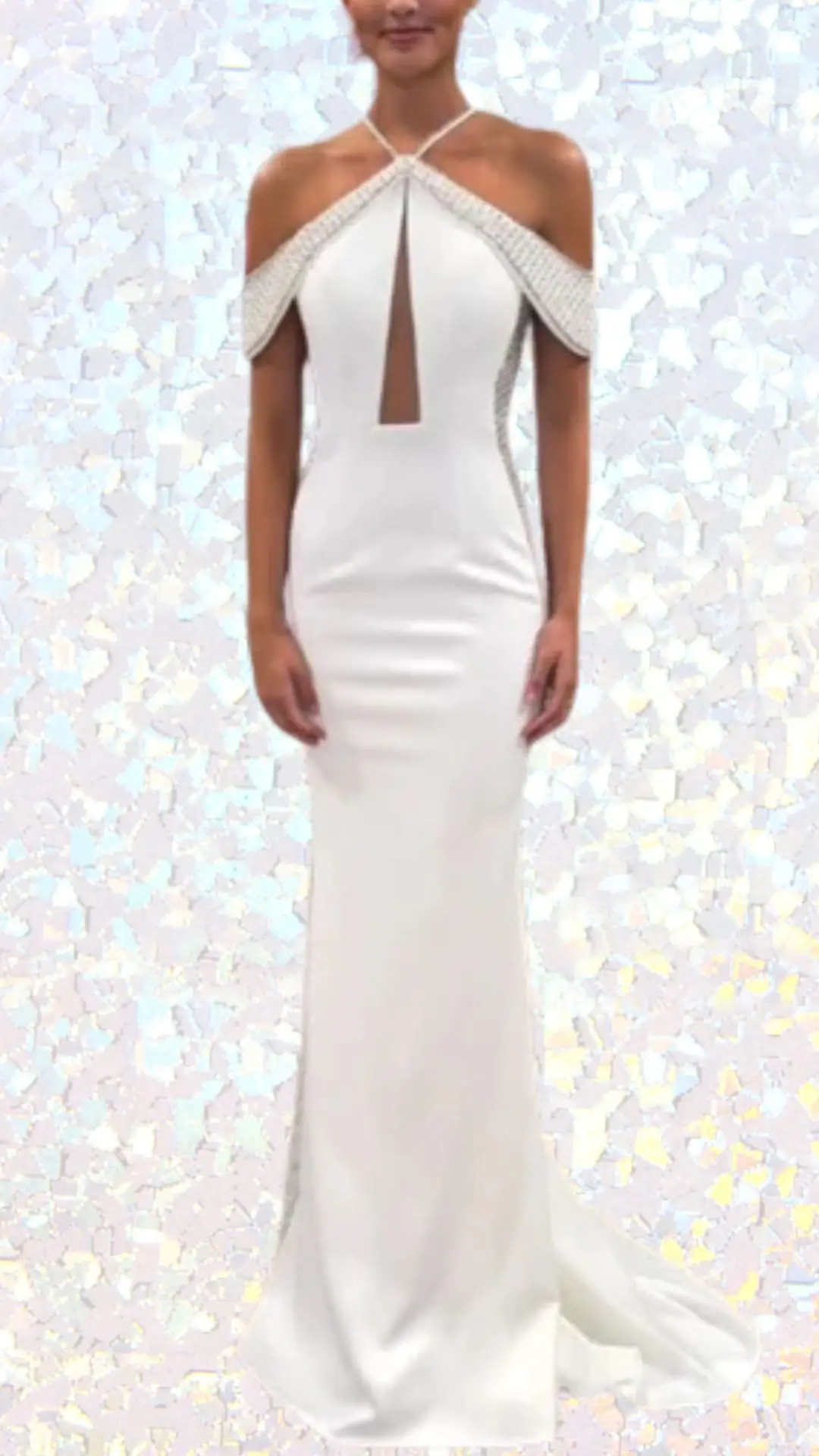 This long, white winter formal dress features a sleek, fitted silhouette made from smooth fabric. It has an elegant keyhole neckline and cap sleeves adorned with intricate beadwork, adding a touch of sophistication. The dress gracefully flows to the floor, creating a timeless look perfect for a formal occasion.