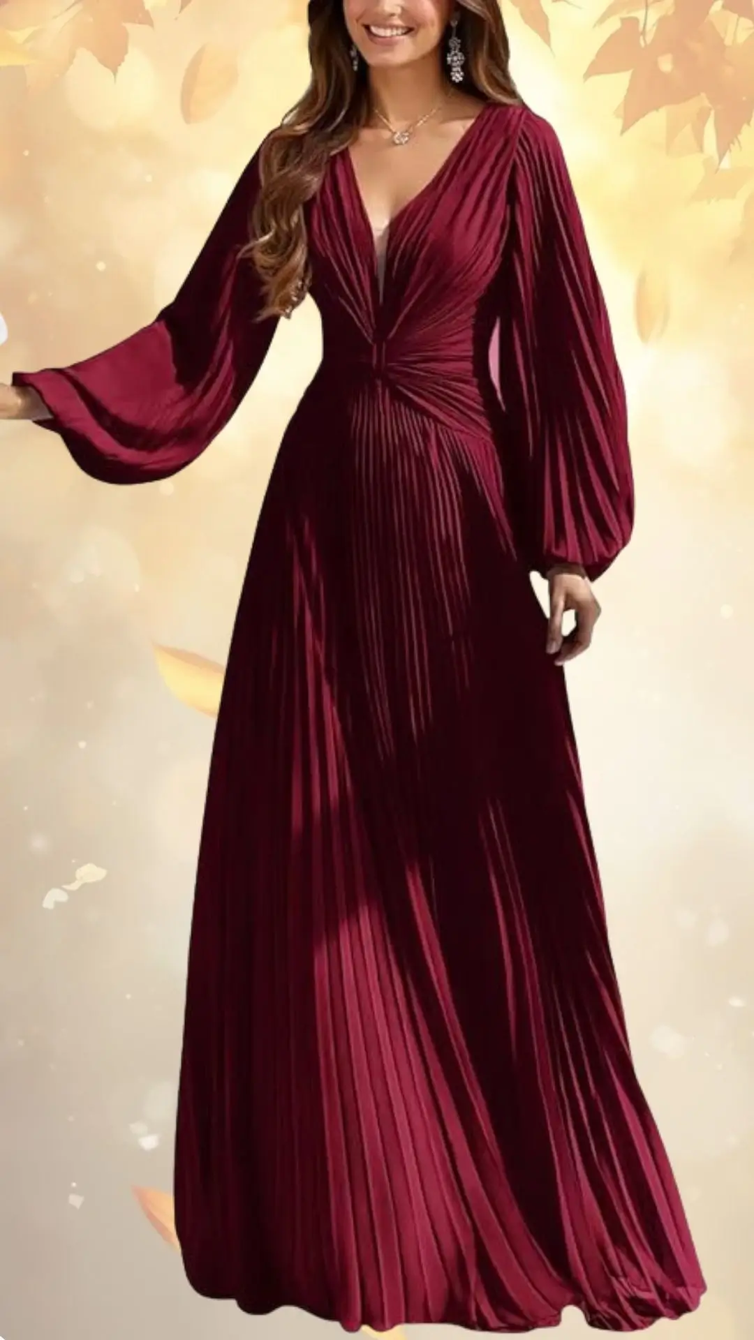 A long burgundy dress features a deep V-neckline and elegant long draped sleeves. The bodice is accentuated with ruching, creating a flattering silhouette that flows into a pleated skirt. The soft fabric adds a touch of sophistication, making it suitable for fall wedding events.